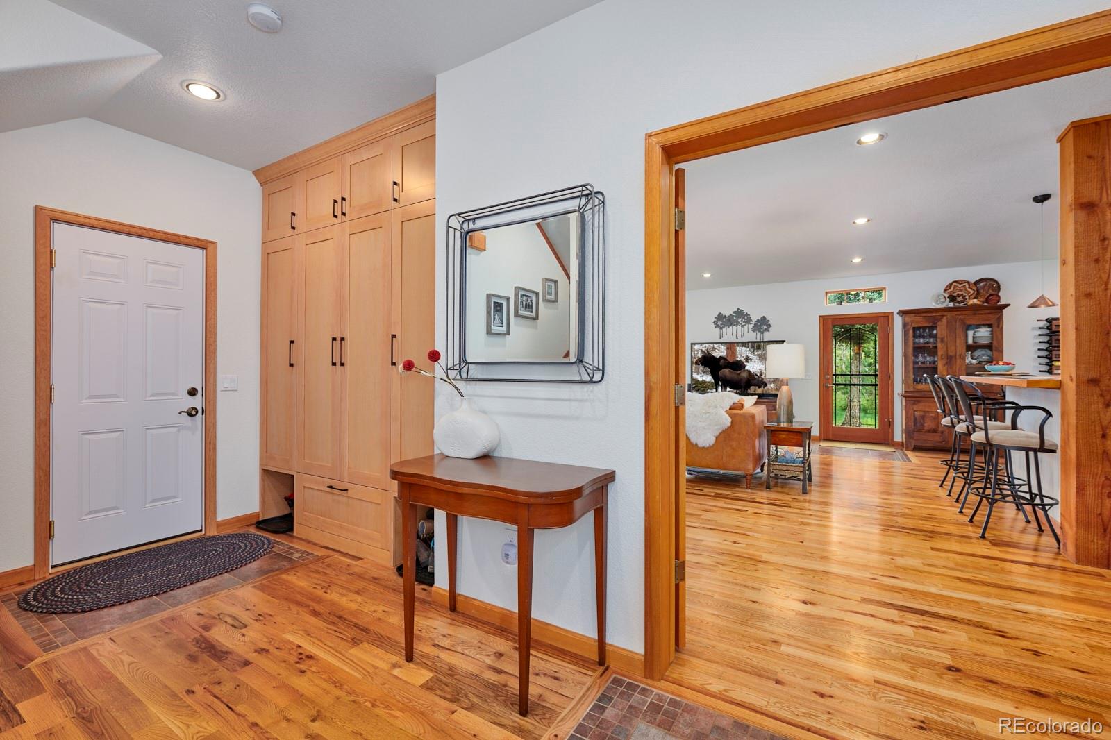 3589 Ridge Road Nederland, CO 80466 - Photo 5 of 40 a view of a livingroom with furniture and wooden floor