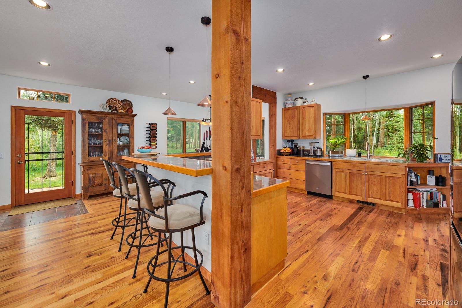 3589 Ridge Road Nederland, CO 80466 - Photo 9 of 40 a living room with furniture and a large window