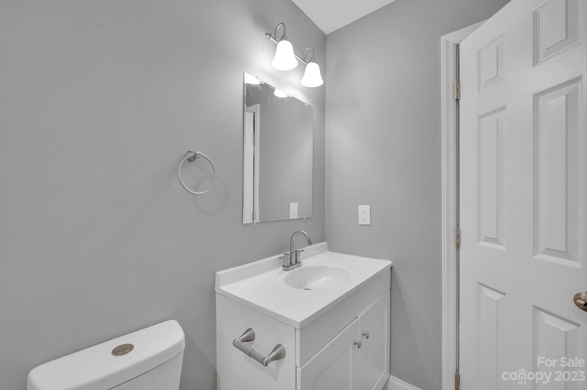 128 Jeter Street Chester, SC 29706 - Photo 14 of 20 a bathroom with a sink vanity and a mirror