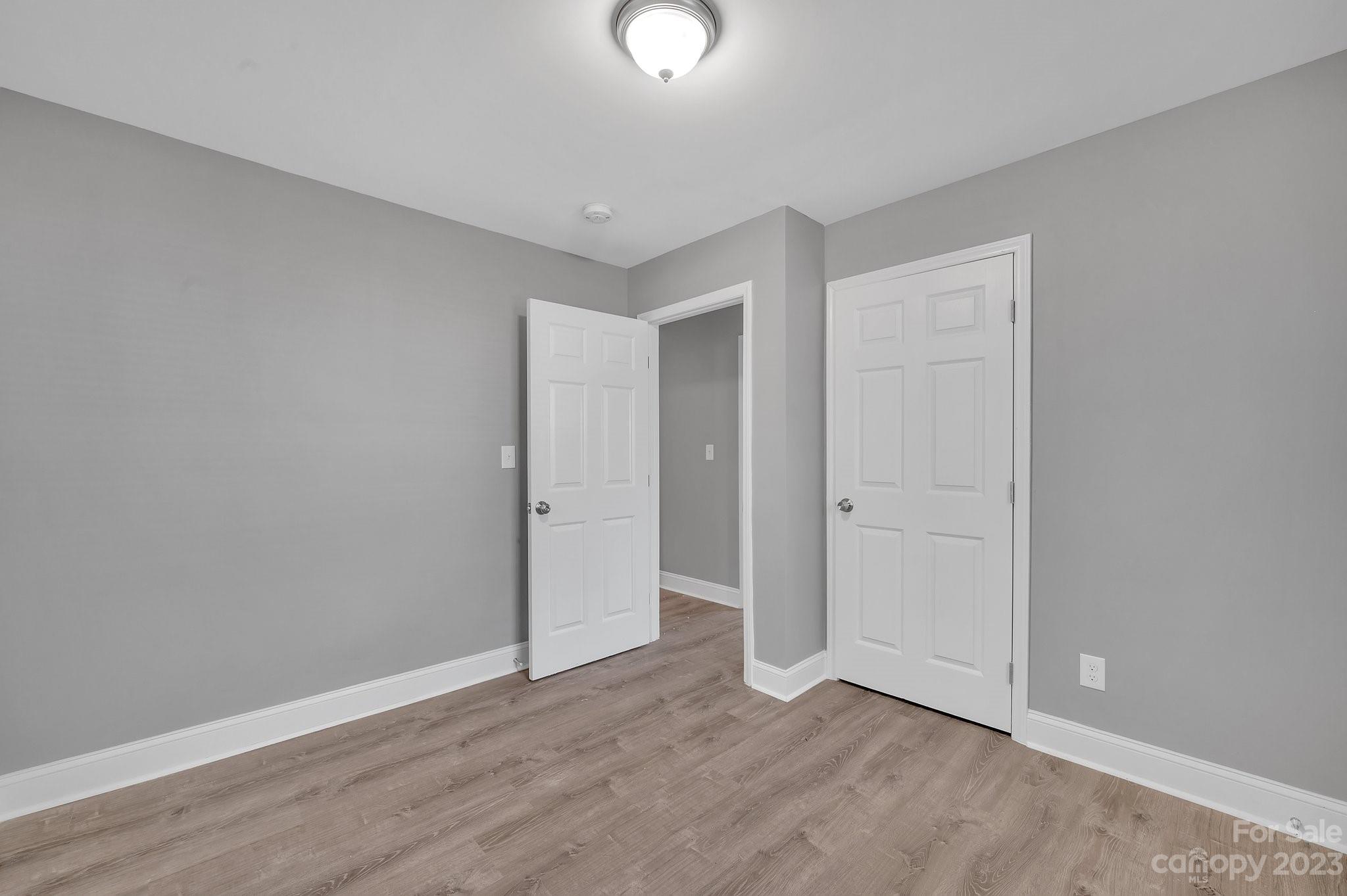 128 Jeter Street Chester, SC 29706 - Photo 16 of 20 a view of an empty room with wooden floor