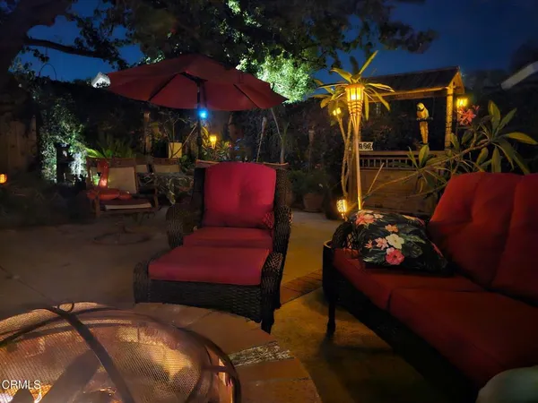 a view of patio with outdoor seating