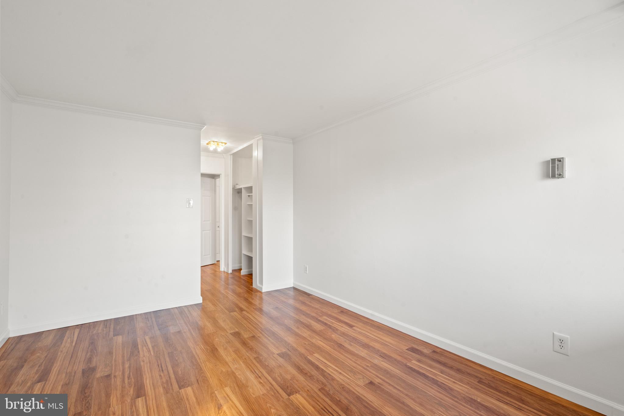 730 24th Street Northwest, Unit 503 Washington, DC 20037 - Photo 11 of 18 a view of room with wooden floor