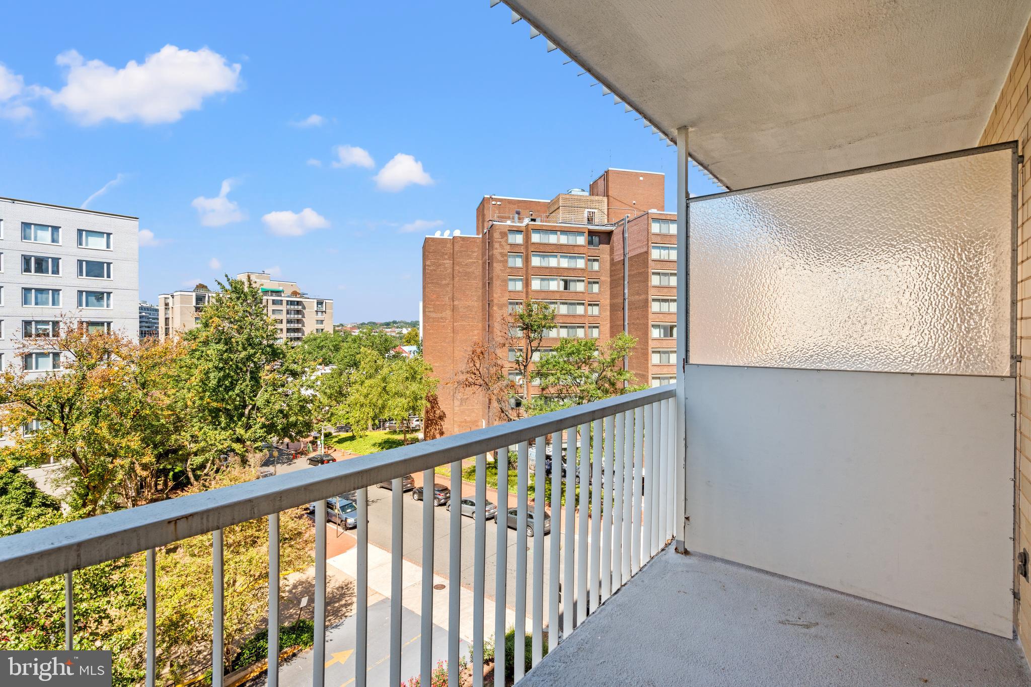 730 24th Street Northwest, Unit 503 Washington, DC 20037 - Photo 13 of 18 a view of balcony with a potted plant