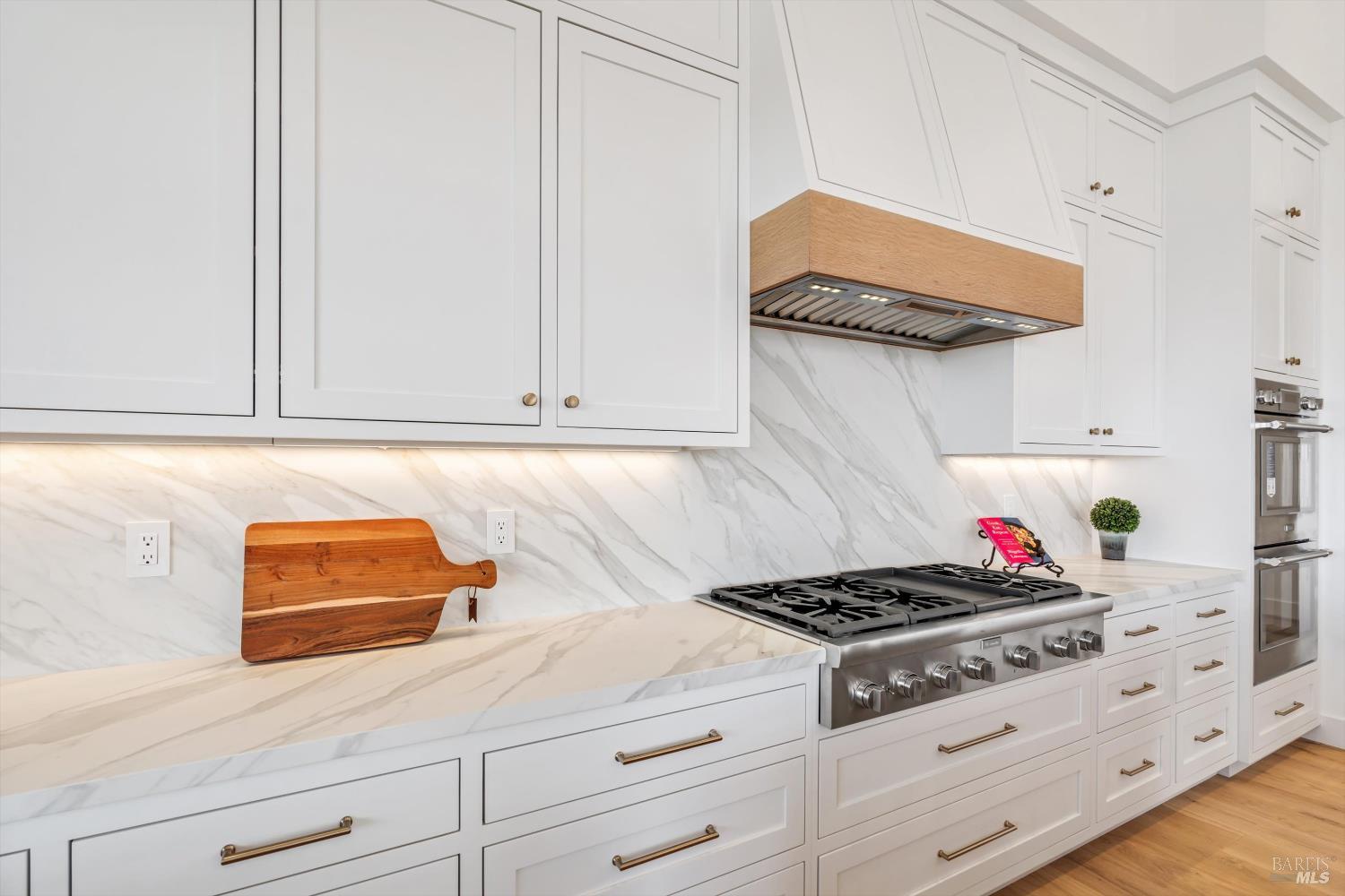 3855 Royal Manor Place Santa Rosa, CA 95404 - Photo 13 of 34 a kitchen with white cabinets and appliances