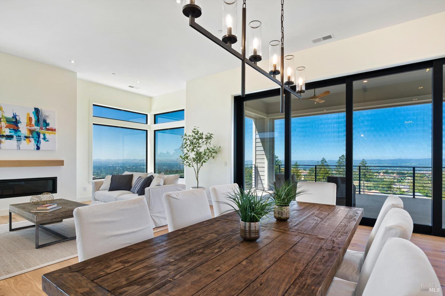 3855 Royal Manor Place Santa Rosa, CA 95404 - Photo 7 of 34 a living room with furniture lamp and a potted plant