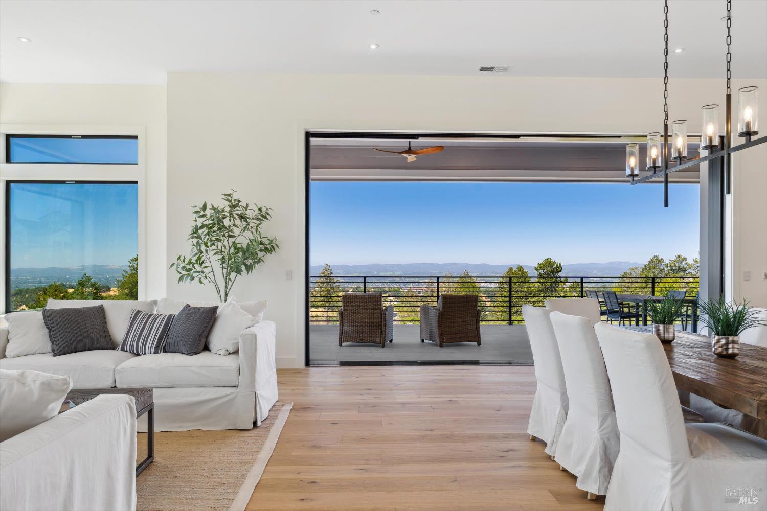 3855 Royal Manor Place Santa Rosa, CA 95404 - Photo 8 of 34 a living room with furniture and potted plants