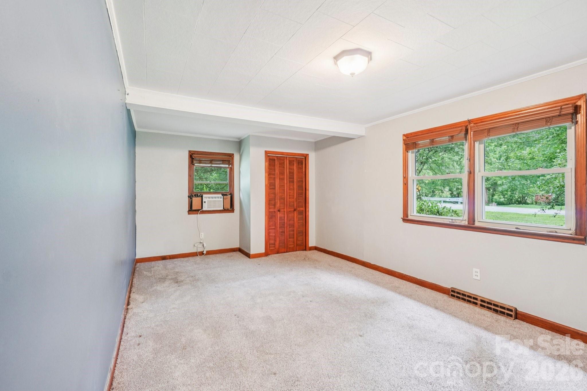 8061 Highway 70 Old Fort, NC 28762 - Photo 18 of 37 an empty room with windows