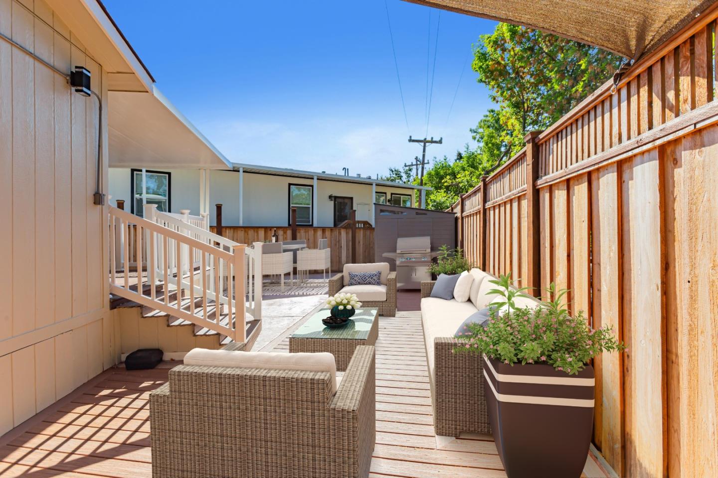 53 Galloway Drive, Unit 53 Concord, CA 94518 - Photo 19 of 24 a view of a patio with couches chairs potted plants and wooden floor