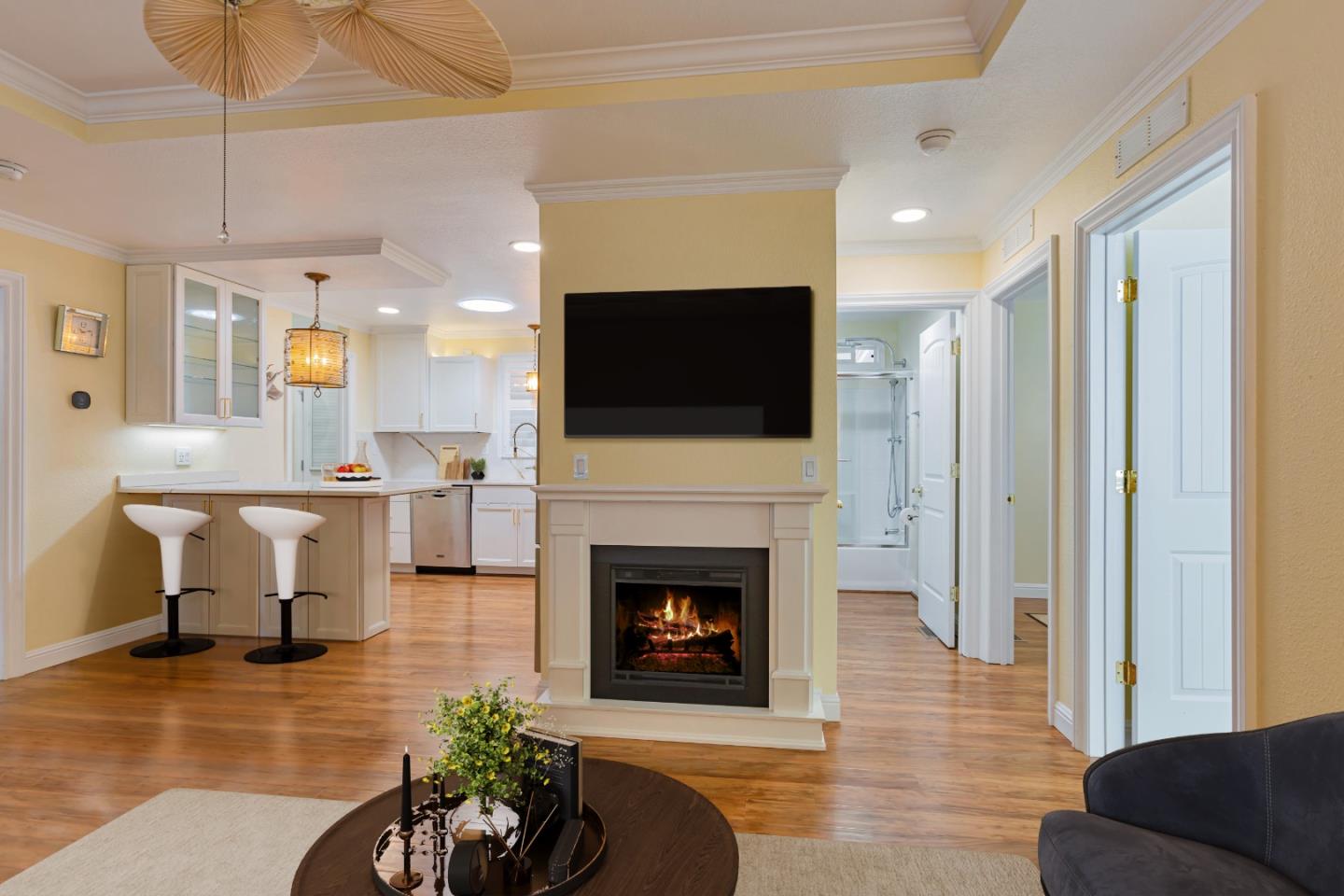 53 Galloway Drive, Unit 53 Concord, CA 94518 - Photo 5 of 24 a living room with furniture a fireplace and a flat screen tv