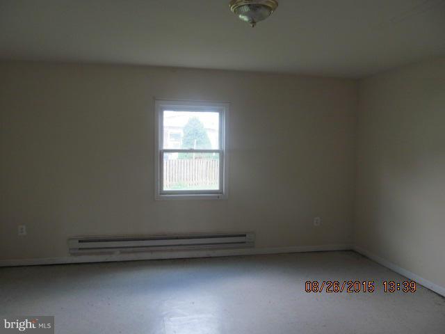 109 South Bend Road Glen Burnie, MD 21060 - Photo 13 of 21 an empty room with a window