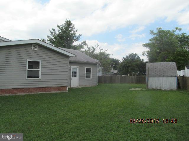 109 South Bend Road Glen Burnie, MD 21060 - Photo 17 of 21 a view of a house with backyard and garden