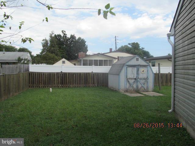 109 South Bend Road Glen Burnie, MD 21060 - Photo 19 of 21 a view of a house with backyard and garden
