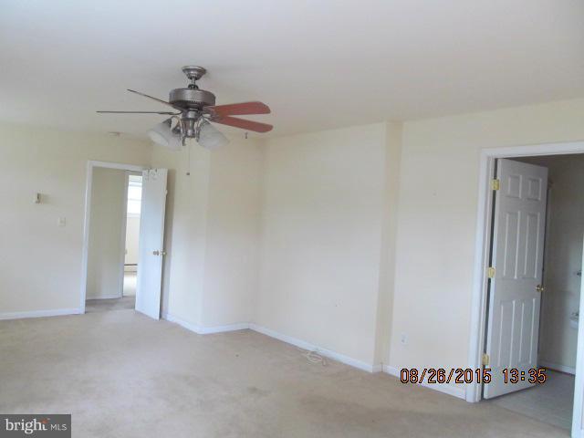 109 South Bend Road Glen Burnie, MD 21060 - Photo 8 of 21 an empty room with a door