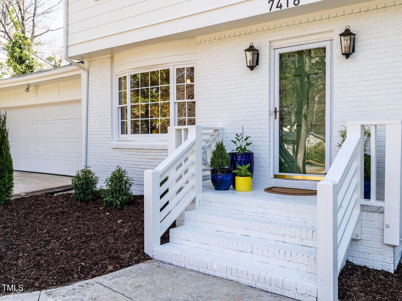 7416 Fiesta Way Raleigh, NC 27615 - Photo 2 of 27 a view of a house with backyard and porch