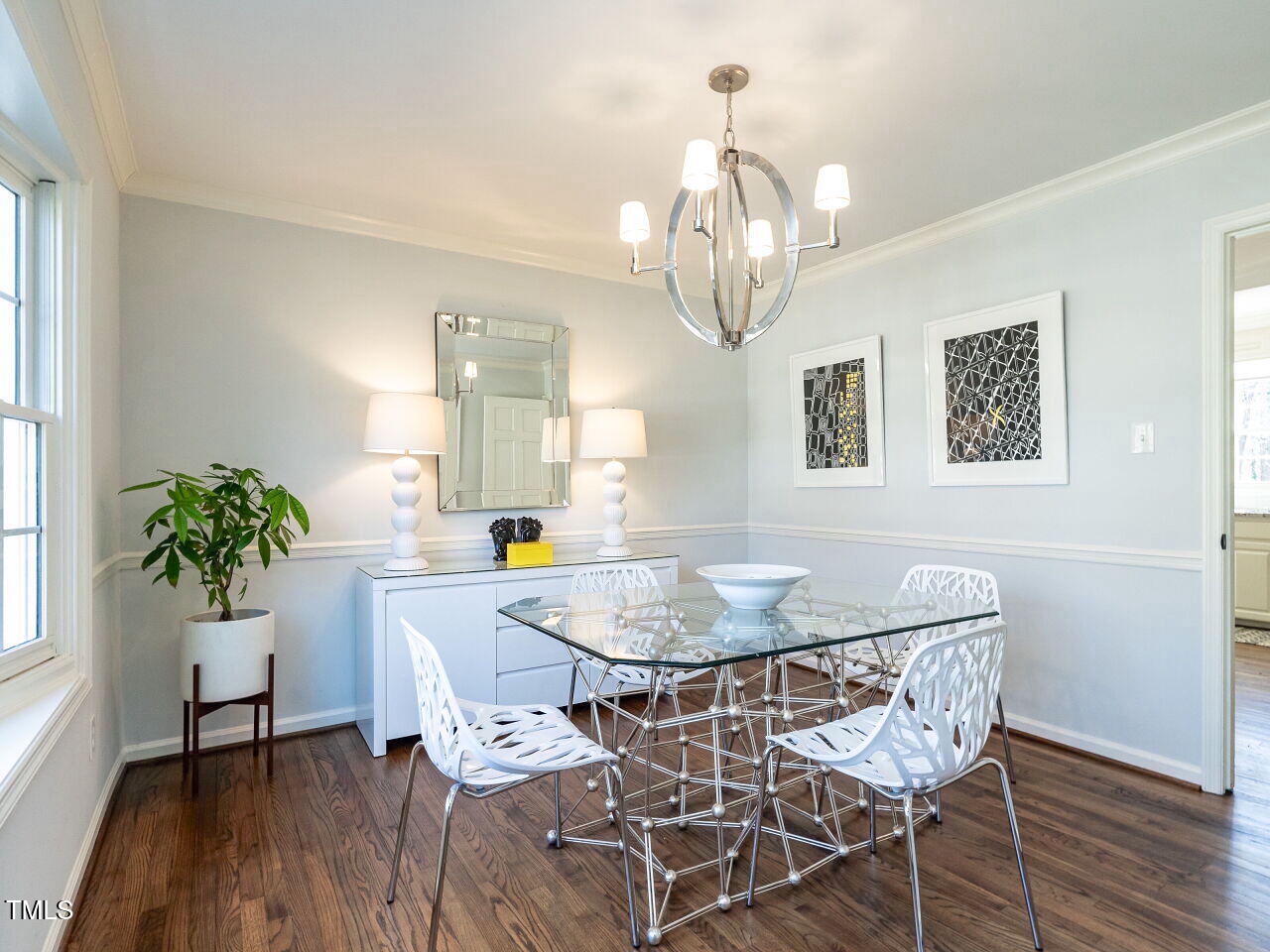 7416 Fiesta Way Raleigh, NC 27615 - Photo 6 of 27 a view of a dining room with furniture and chandelier