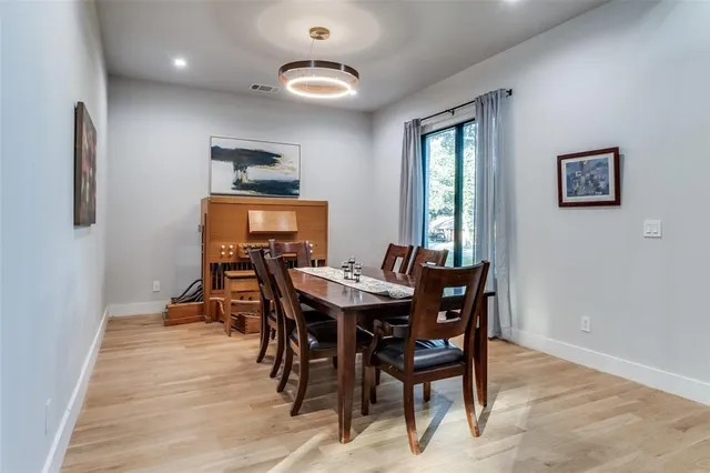a view of walk in closet with clothes