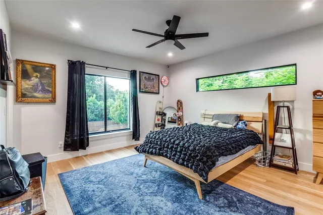 a bedroom with a bed and a table