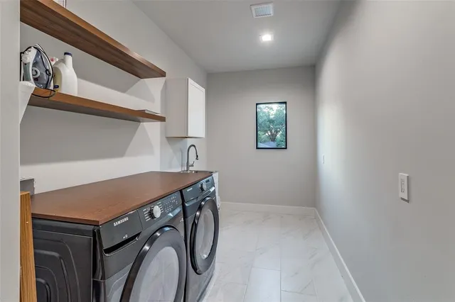 a bathroom with a toilet and a mirror