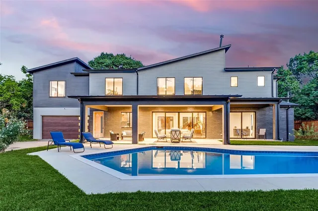 a front view of building with yard