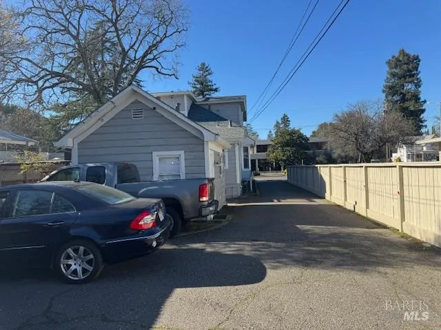 a front view of a house with parking space