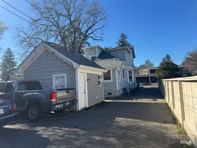 a view of a car in front of house