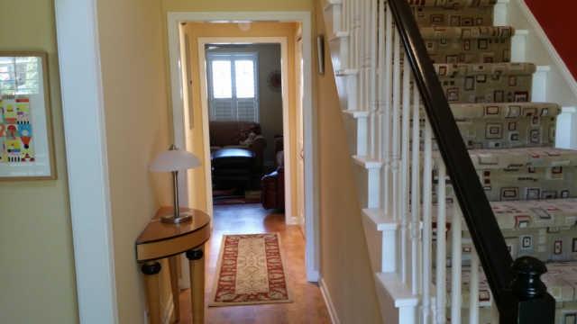 1034 General George Patton Road, Unit 1034 Nashville, TN 37221 - Photo 7 of 20 From the front door, your guests are greeted with an impressive staircase and entryway adjacent to the formal living room.