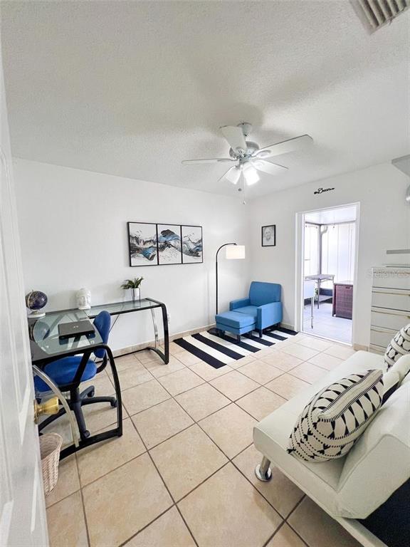 307 Diamond Ridge Boulevard Auburndale, FL 33823 - Photo 15 of 31 a bedroom with furniture and a chandelier