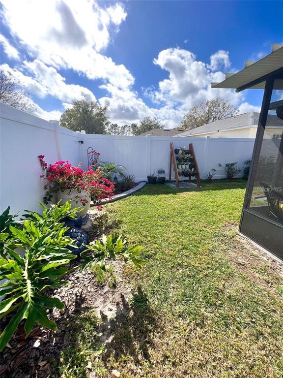 307 Diamond Ridge Boulevard Auburndale, FL 33823 - Photo 26 of 31 a view of a back yard