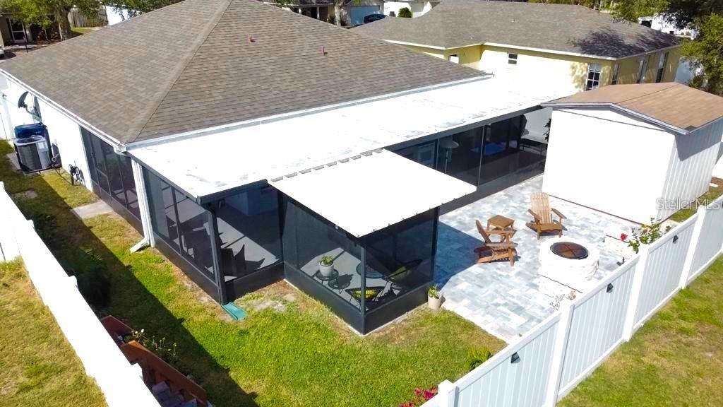 307 Diamond Ridge Boulevard Auburndale, FL 33823 - Photo 30 of 31 a aerial view of a house with backyard