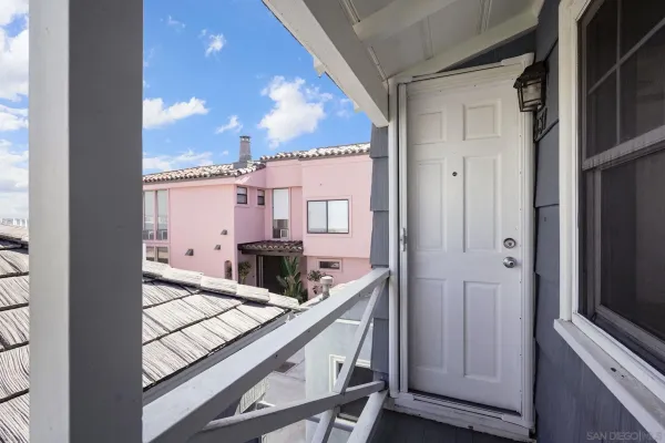 a view of a house with a street