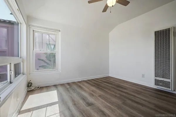 a view of a living room and entry way