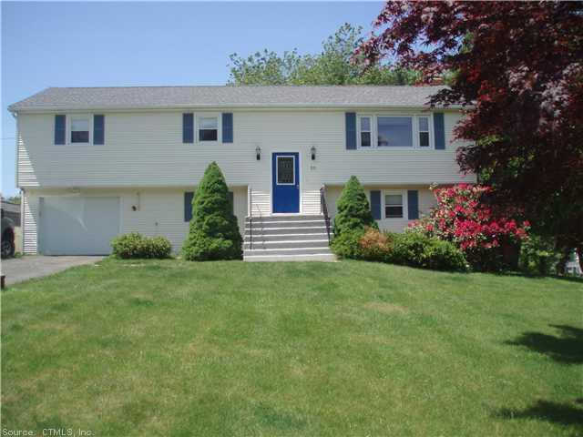 55 Beech Road Tolland, CT 06084 - Photo 1 of 1 Exterior Front. New exterior features include roof, windows, painted back deck and front stairs, and concrete walkway.