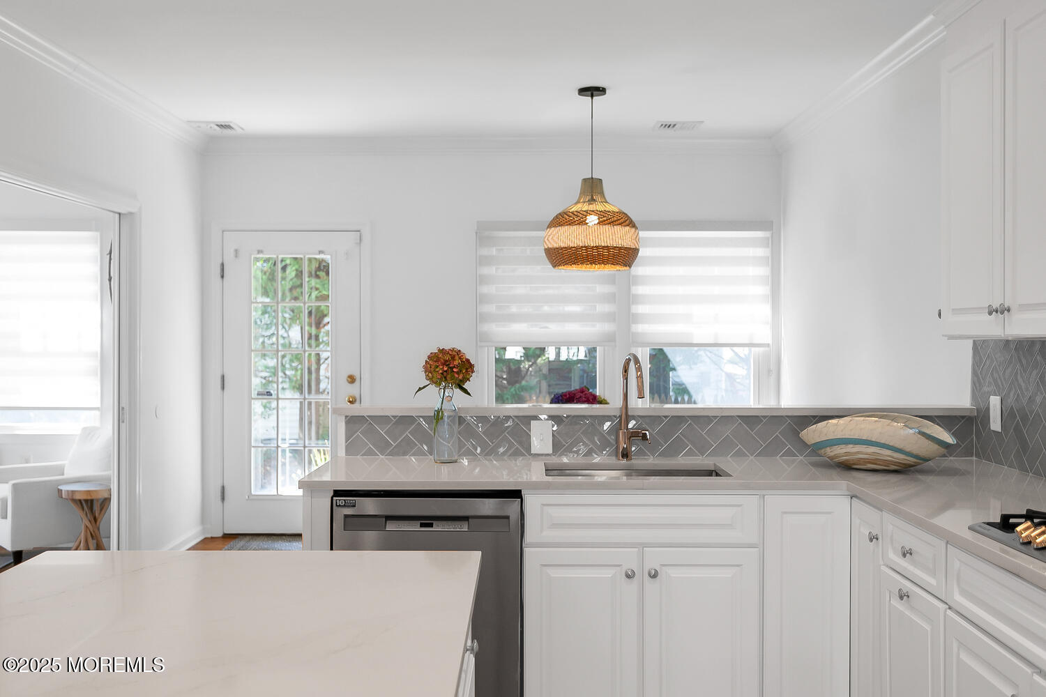 306 Ocean Road Spring Lake, NJ 07762 - Photo 17 of 58 a kitchen with a sink a stove and a window