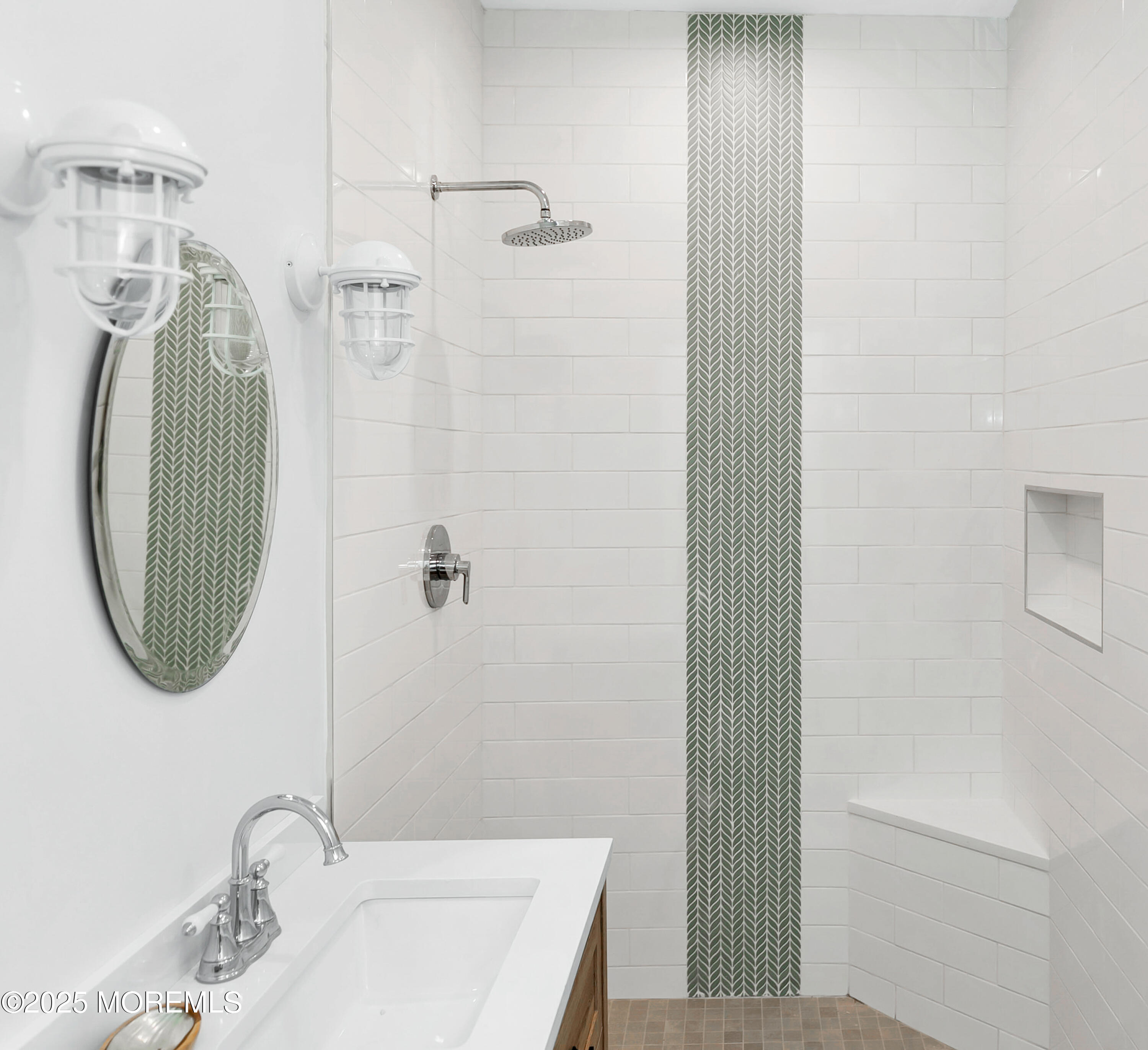 306 Ocean Road Spring Lake, NJ 07762 - Photo 20 of 58 a bathroom with a sink and a mirror