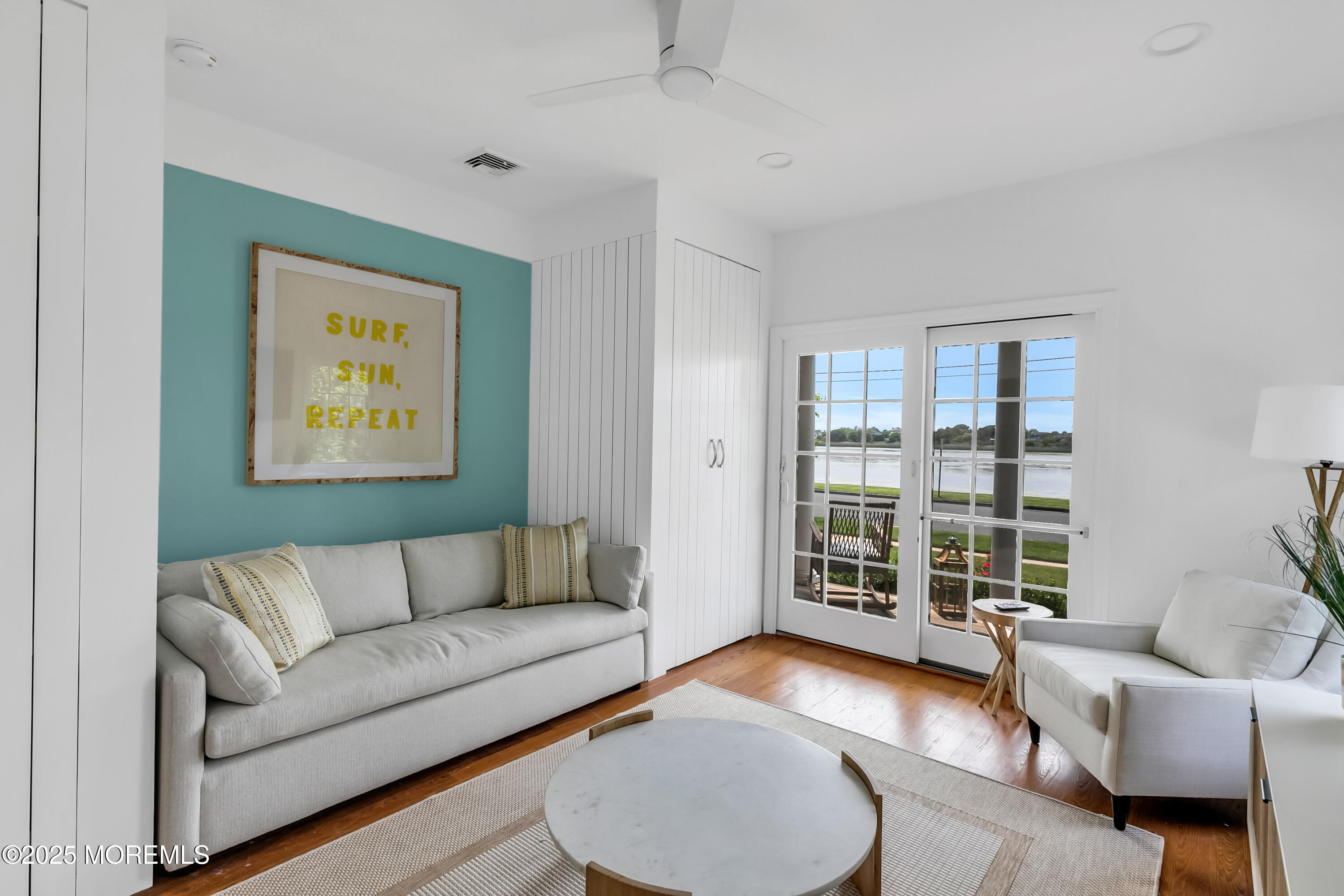 306 Ocean Road Spring Lake, NJ 07762 - Photo 21 of 58 a living room with furniture and a large window