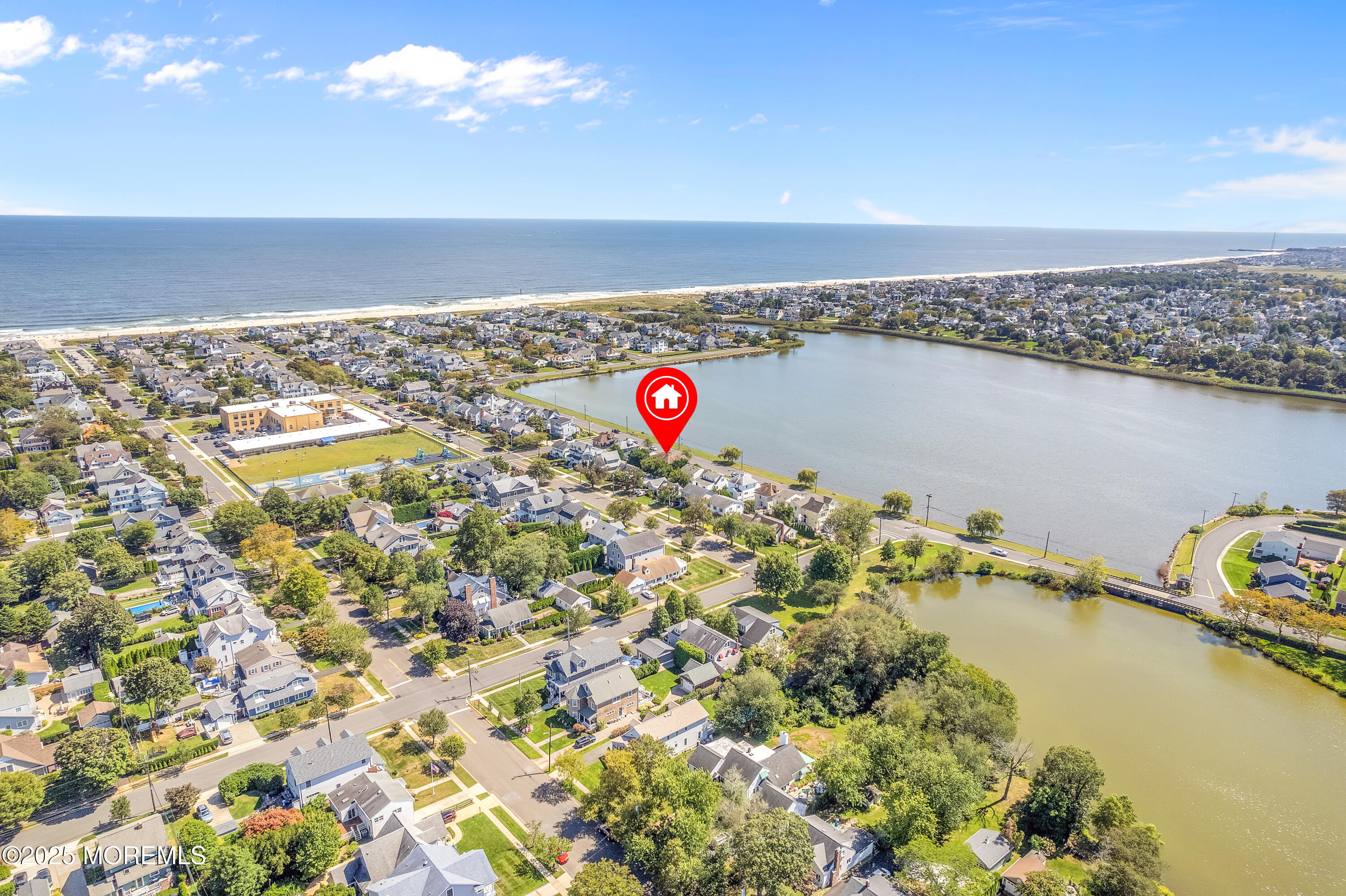 306 Ocean Road Spring Lake, NJ 07762 - Photo 41 of 58 a view of an ocean and beach