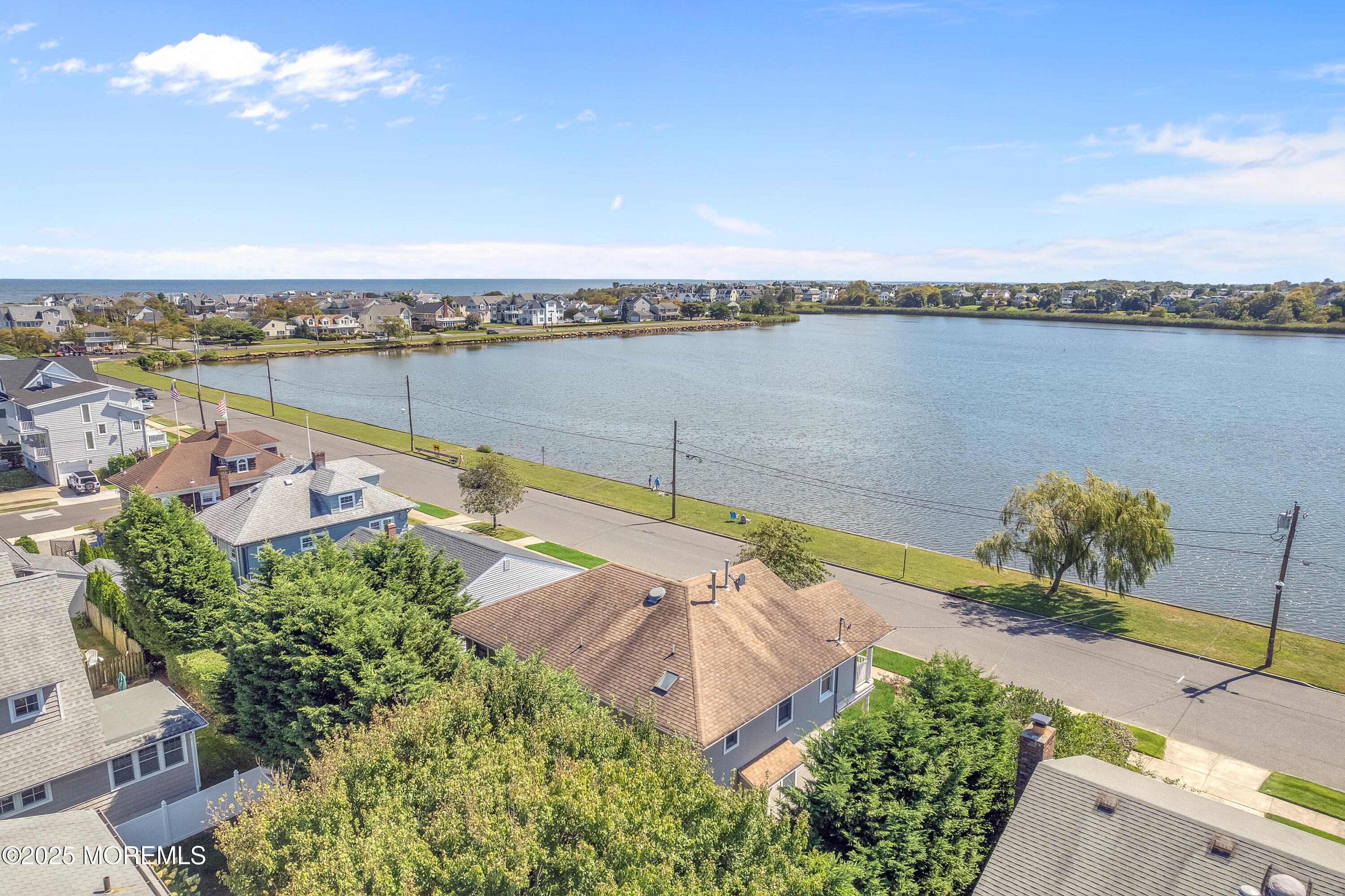 306 Ocean Road Spring Lake, NJ 07762 - Photo 45 of 58 an aerial view of a house with a outdoor space