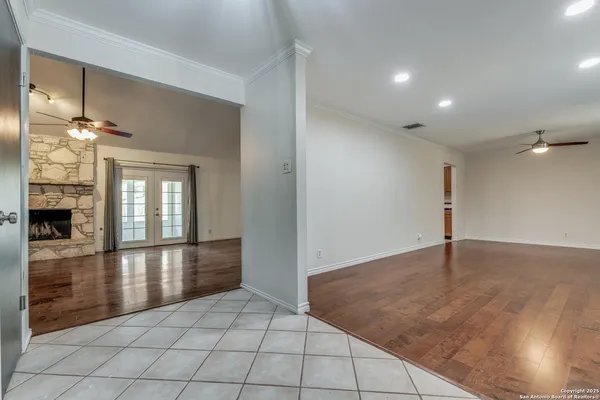 a view of a hallway with a chandelier