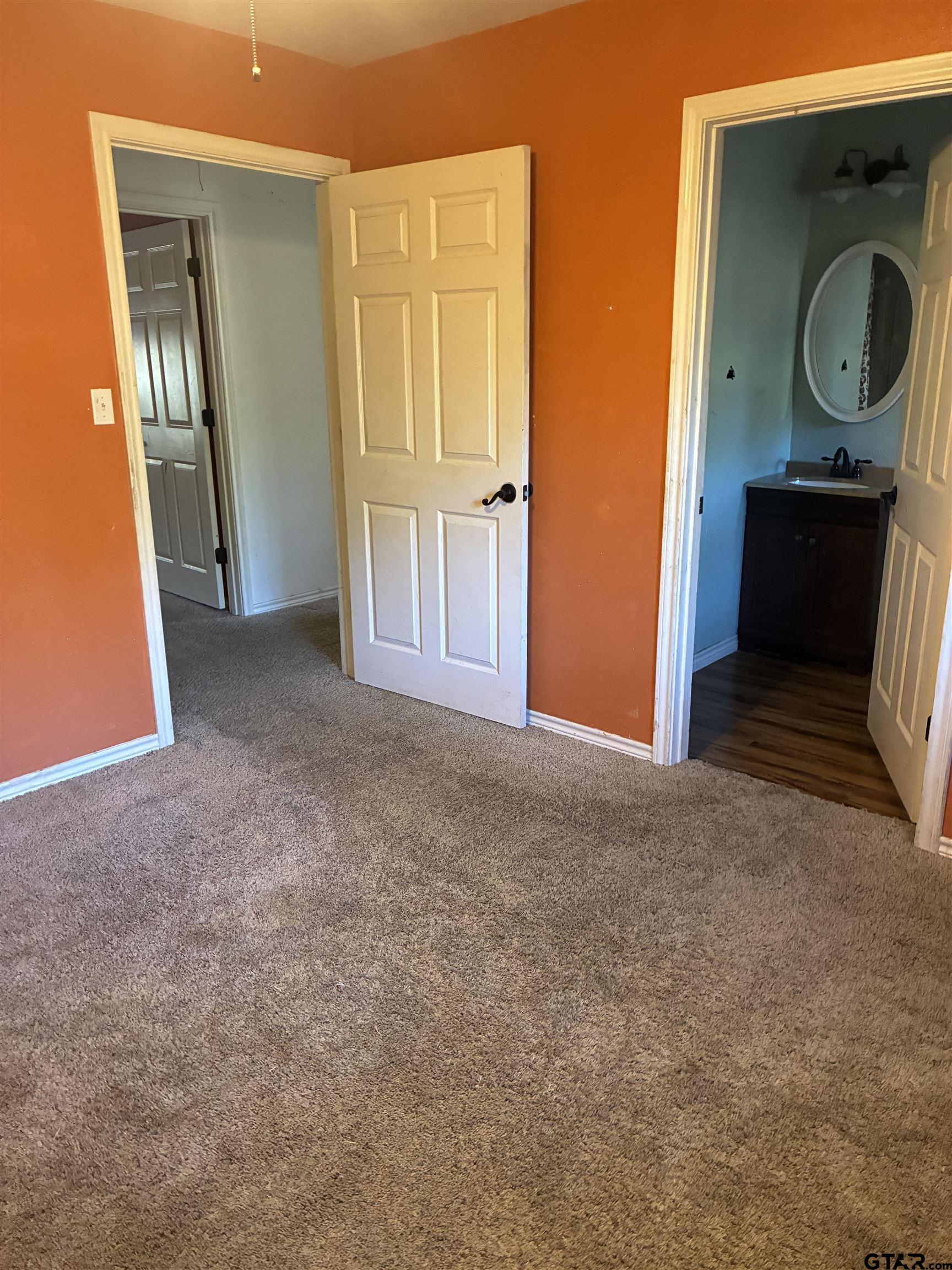 20519 Highway 69 Rusk, TX 75785 - Photo 6 of 20 a view of an empty room with closet and wooden floor