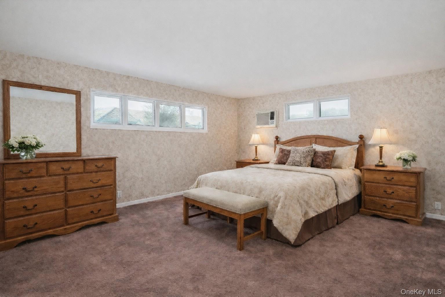 47 Vincent Road Hicksville, NY 11801 - Photo 11 of 21 a bedroom with a bed and a dresser