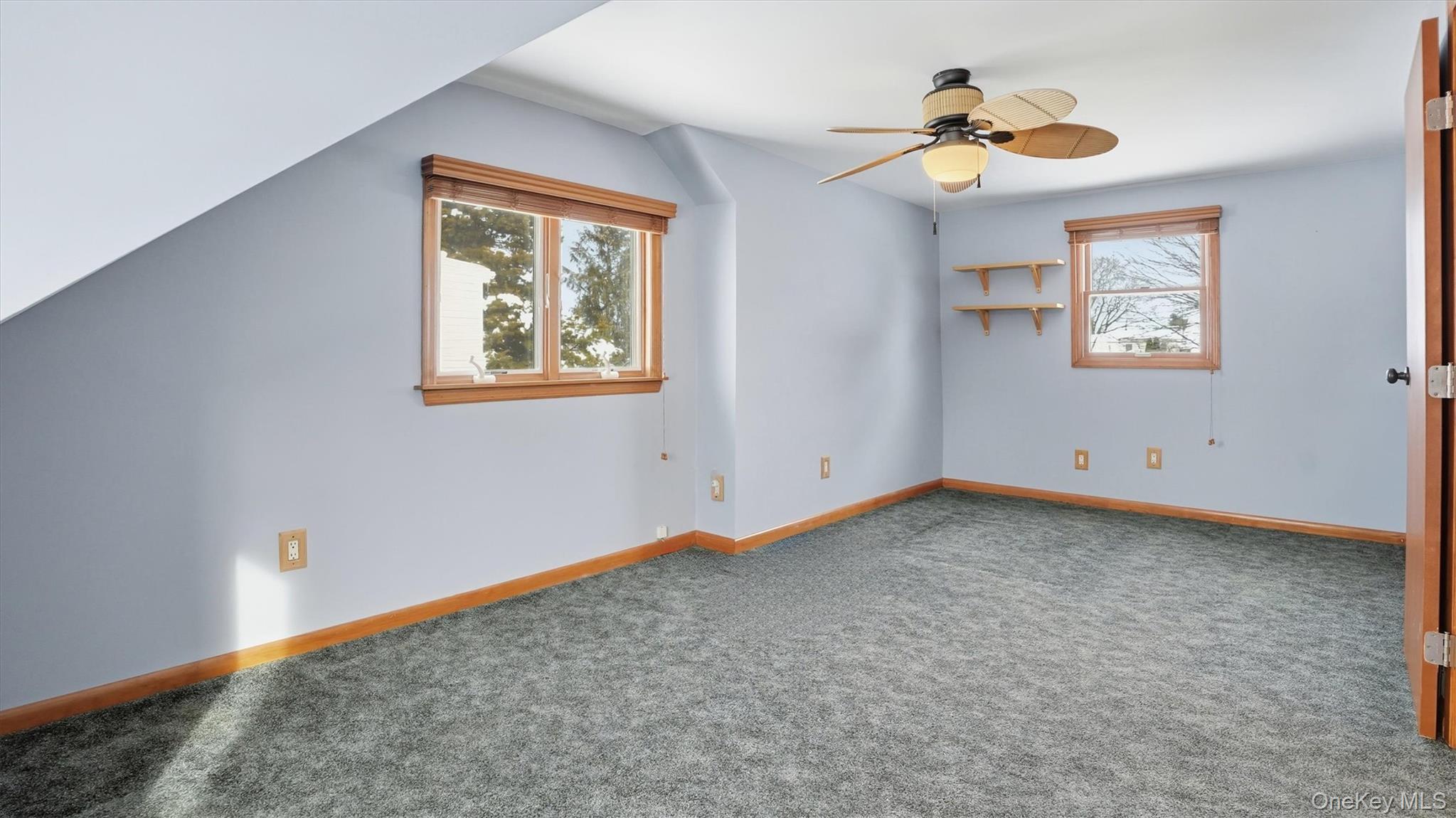 47 Vincent Road Hicksville, NY 11801 - Photo 15 of 21 a view of an empty room with a window