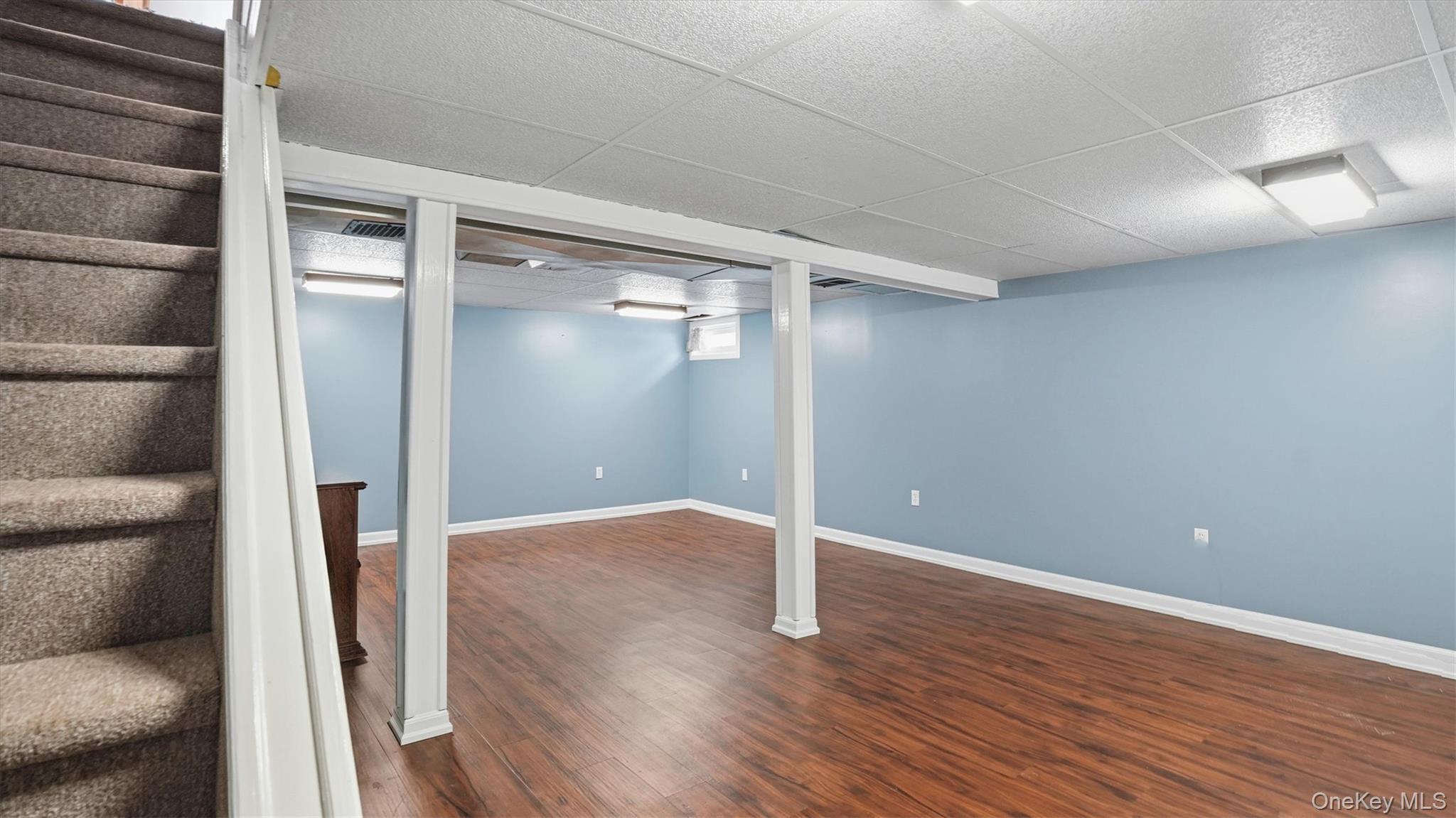 47 Vincent Road Hicksville, NY 11801 - Photo 17 of 21 a view of livingroom with hardwood floor and closet
