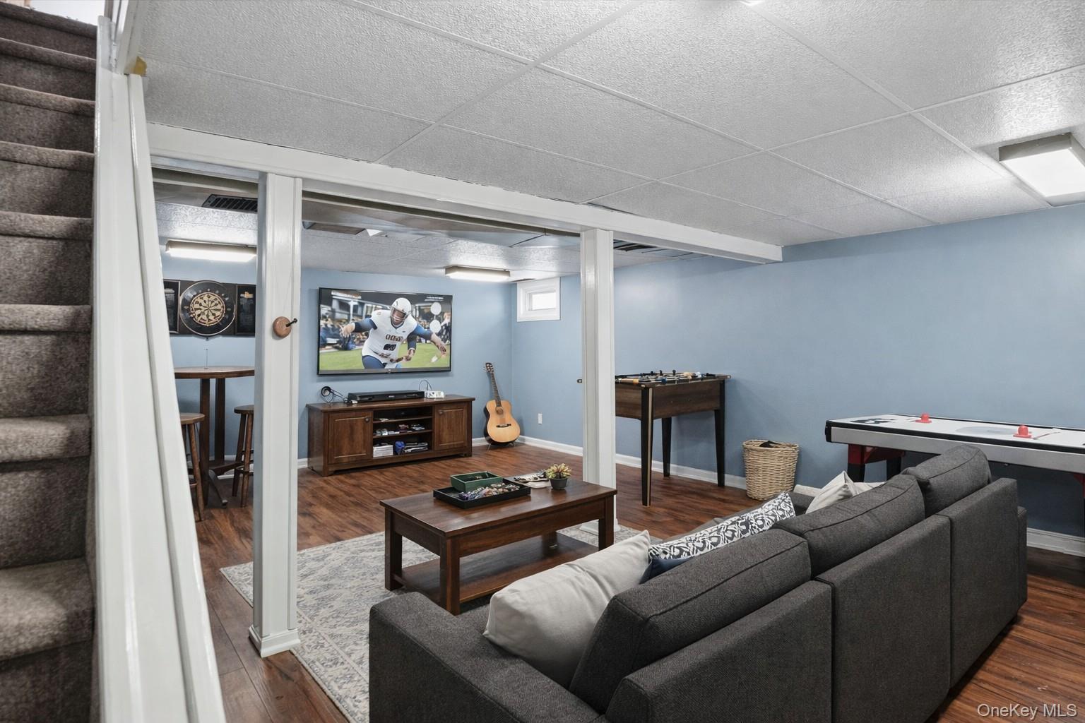 47 Vincent Road Hicksville, NY 11801 - Photo 18 of 21 a living room with furniture and a table