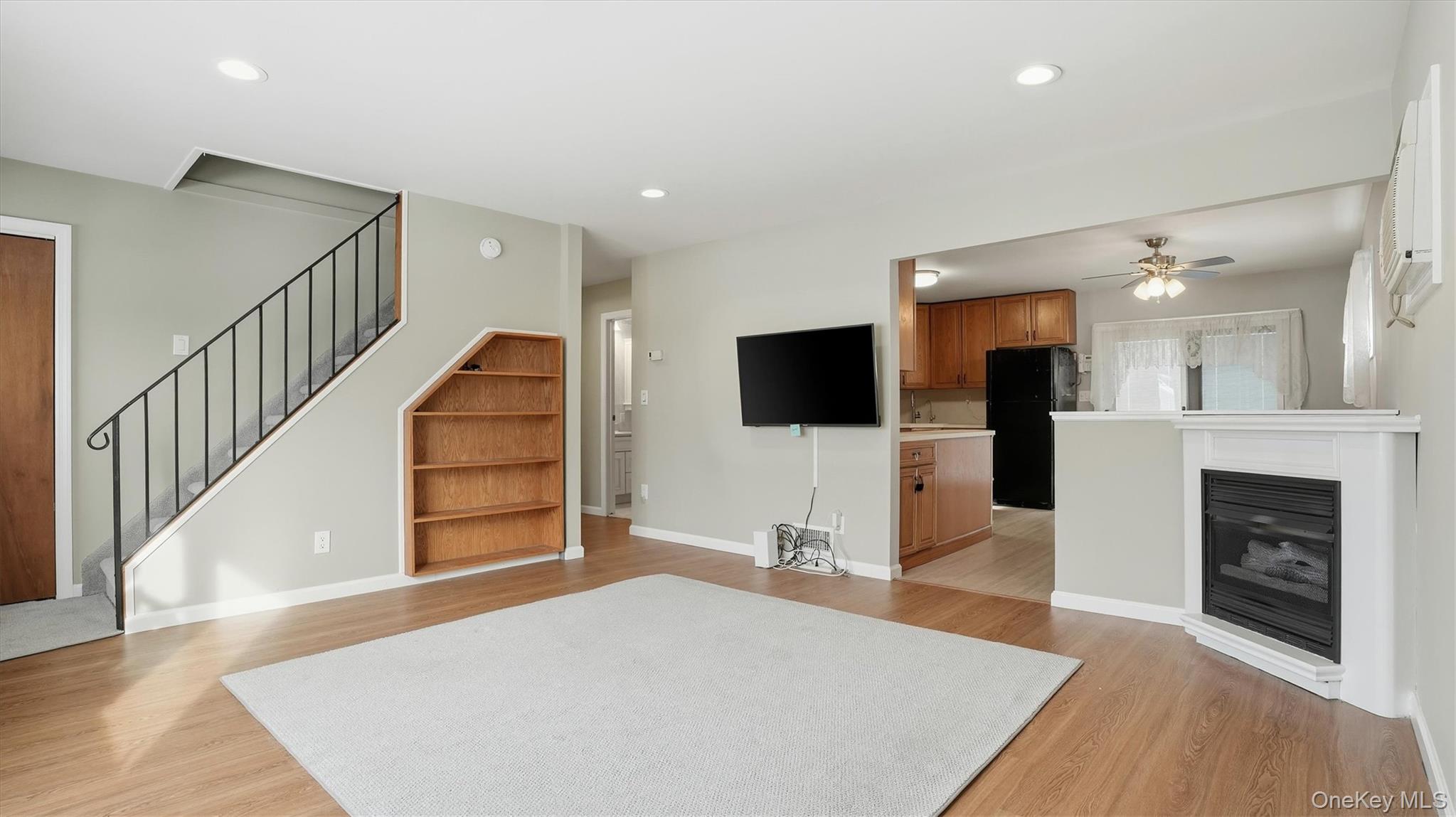 47 Vincent Road Hicksville, NY 11801 - Photo 5 of 21 a living room with furniture and a flat screen tv