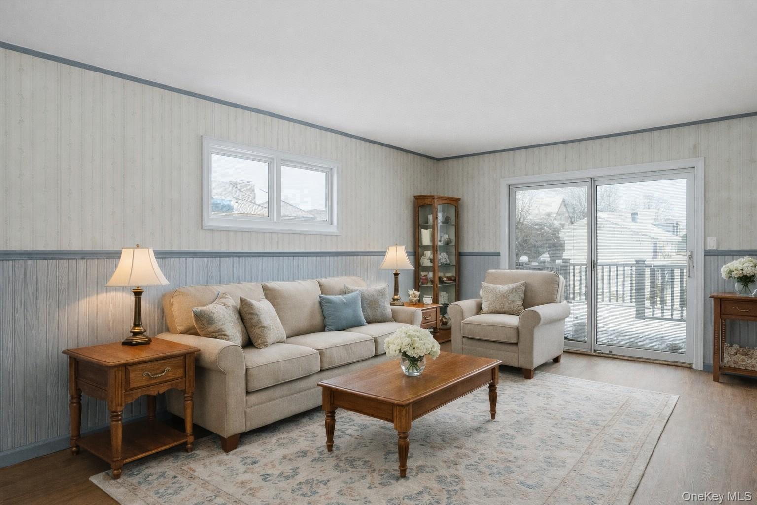 47 Vincent Road Hicksville, NY 11801 - Photo 9 of 21 a living room with furniture and a large window
