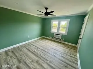 a view of a room with a large window