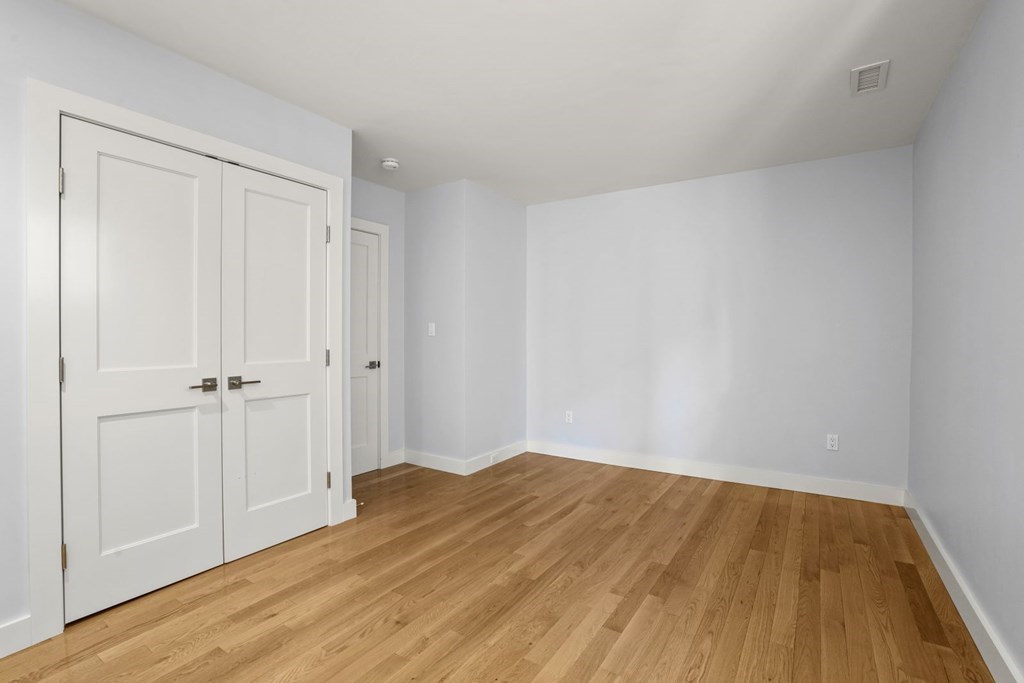 14 Hardwick Street, Unit 1 Cambridge, MA 02141 - Photo 4 of 31 a view of a room with wooden floor