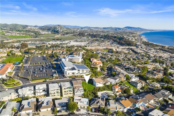 a view of city with ocean