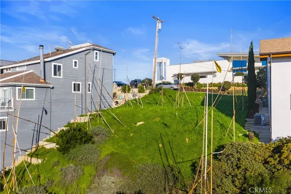 a view of an house with a backyard