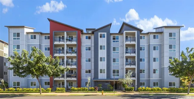 a front view of a building with street view